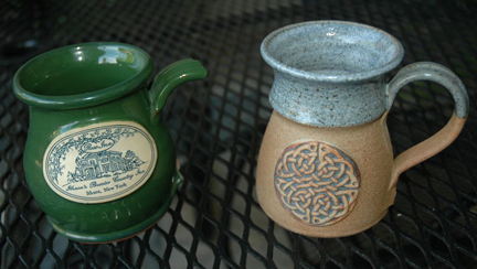 picture of that broken Rose Hill Inn mug, along with a distant 'cousin' mug from Scotland
